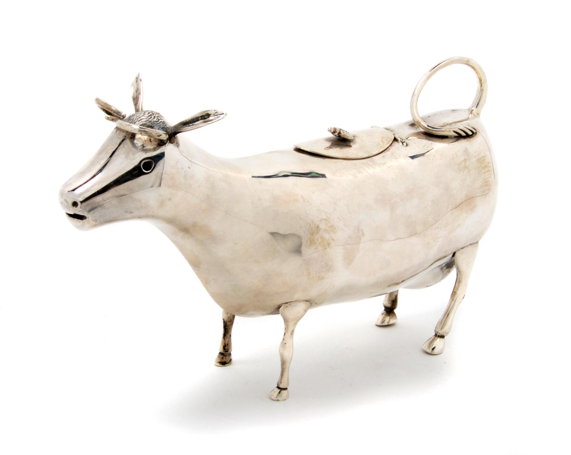A Dutch Silver Cow Creamer, Length 8 inches.