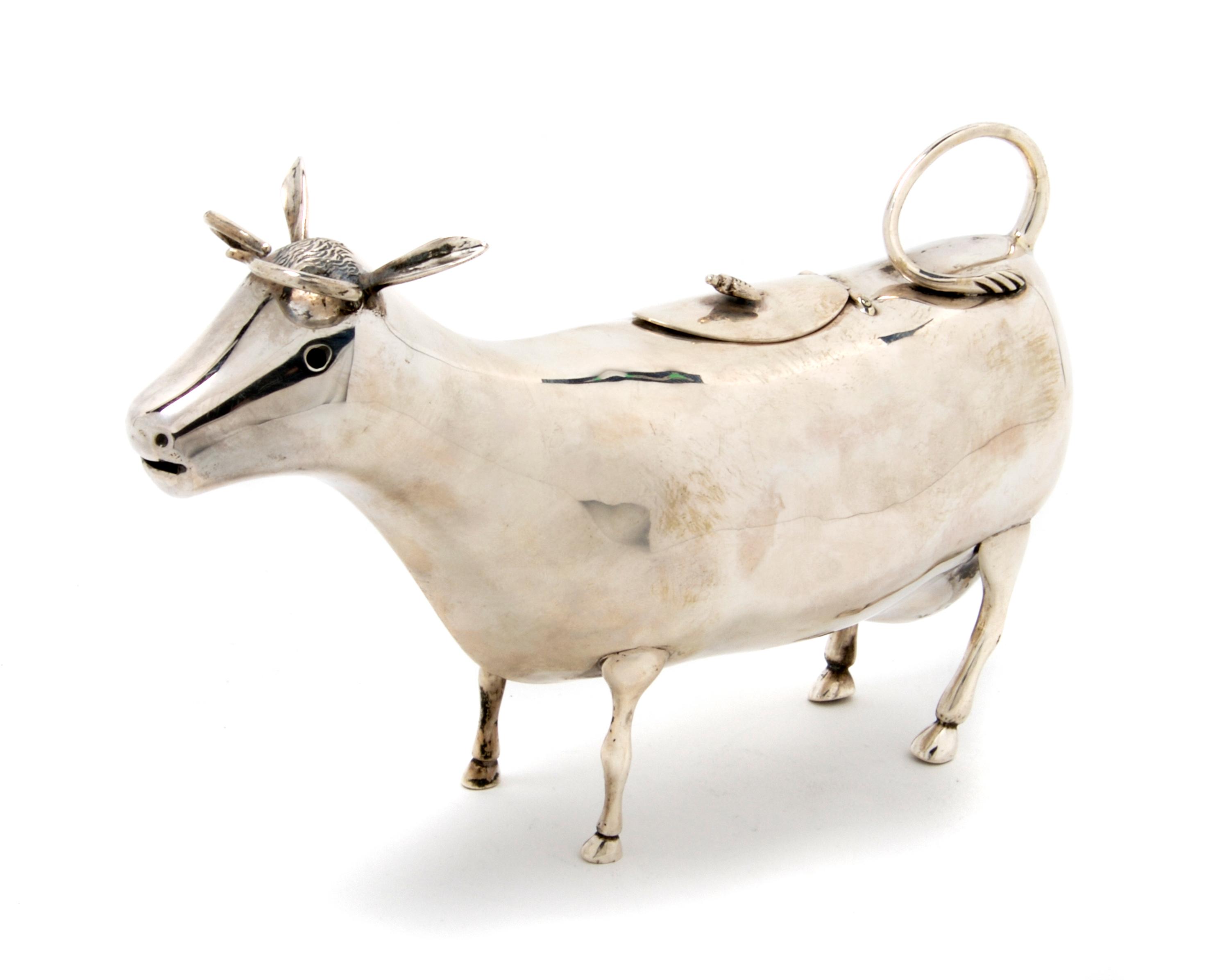 A Dutch Silver Cow Creamer, Length 8 inches.