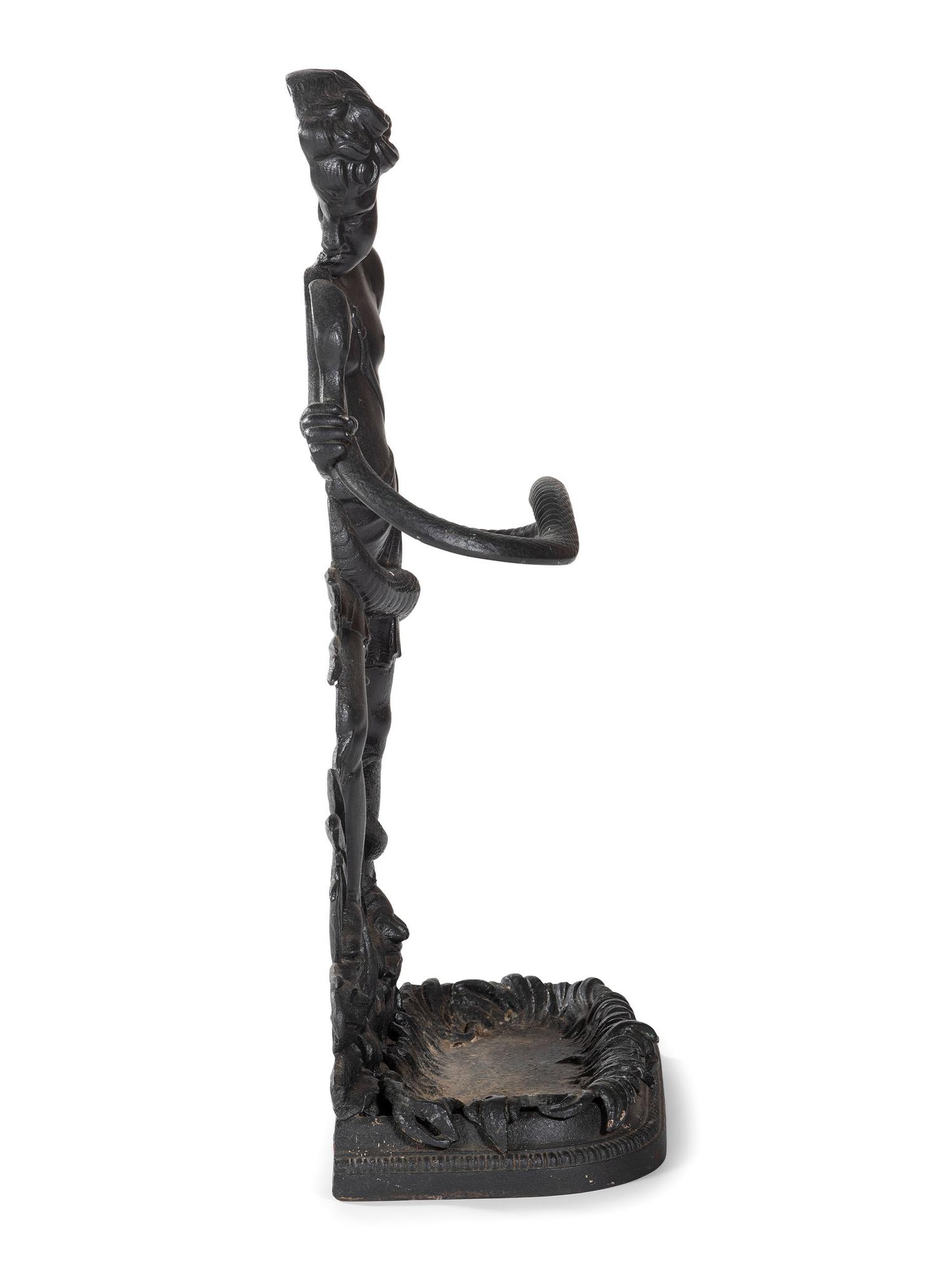 A Cast Iron Putto and Serpent Umbrella Stand