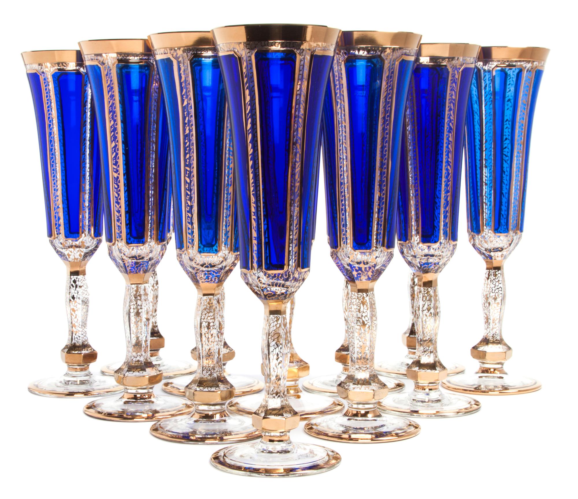 A Set of Twelve Parcel Gilt Cobalt and Clear Glass Champagne Flutes Height 9 inches.