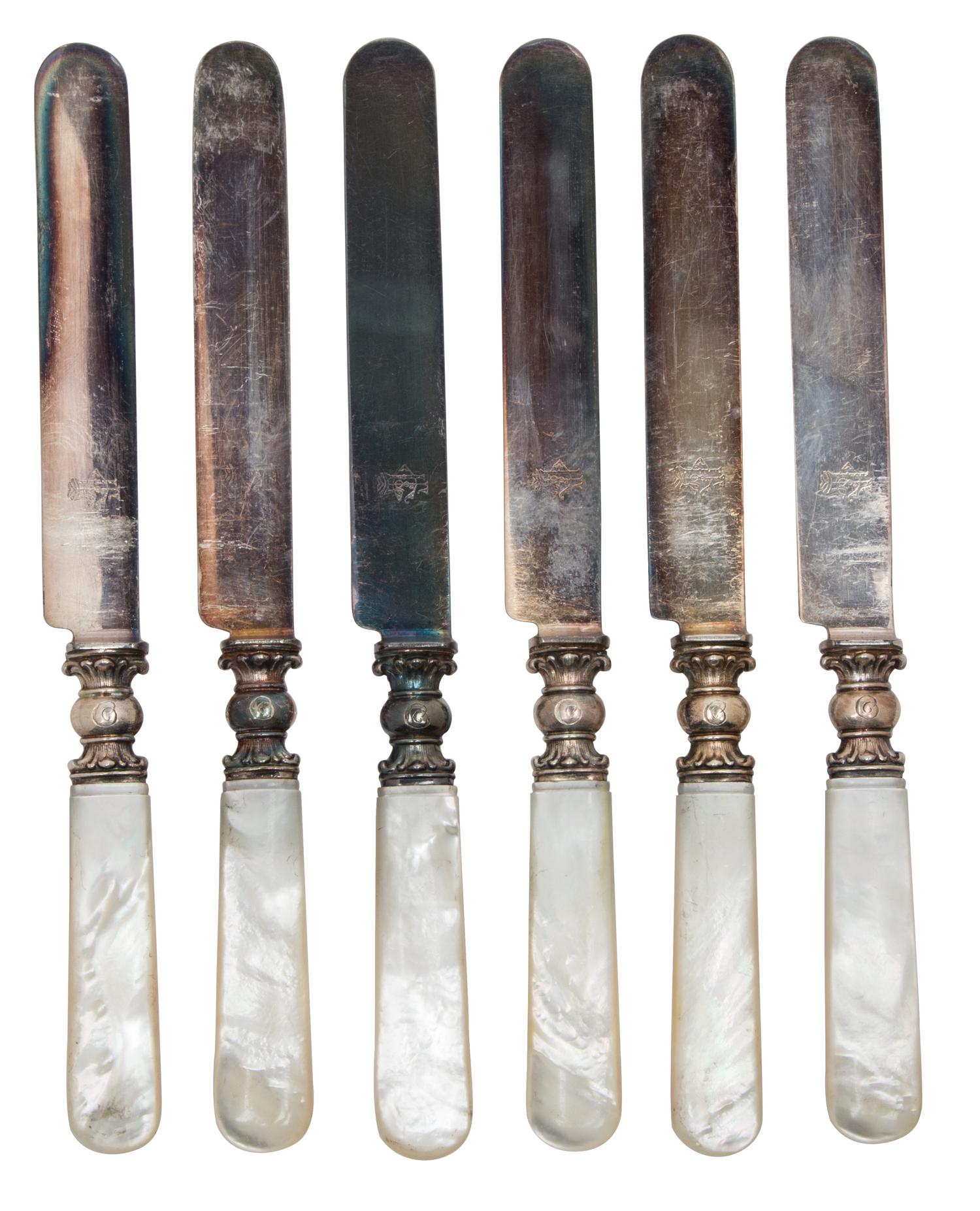 A Set of Twelve Mother-of-Pearl Handled Silver Knives, ,
