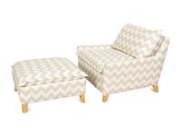 A Contemporary Upholstered Armchair and Ottoman
