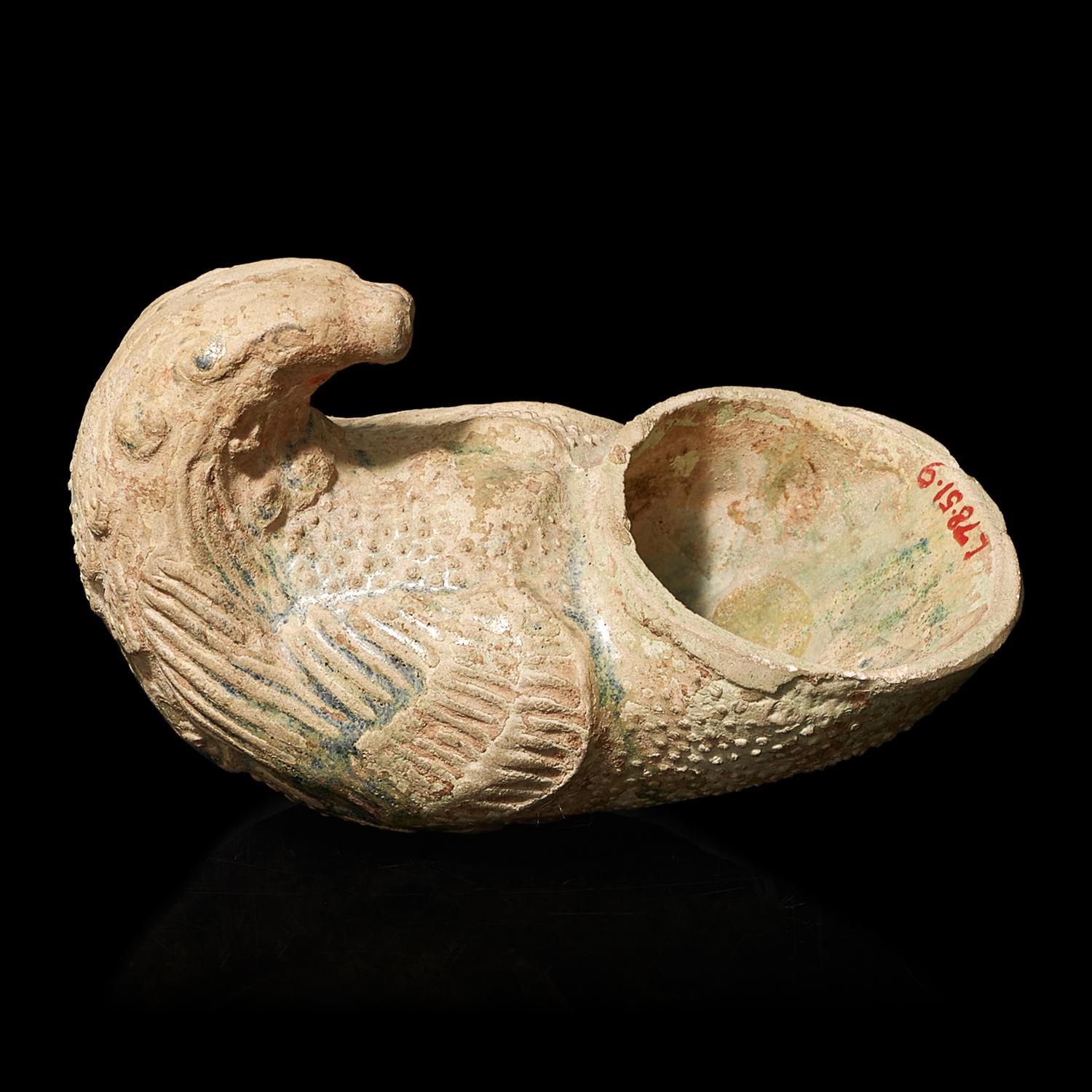 A Chinese Green Glazed Pottery 'Parrot' Rhyton Cup, Tang Dynasty 唐 綠釉鸚鵡杯