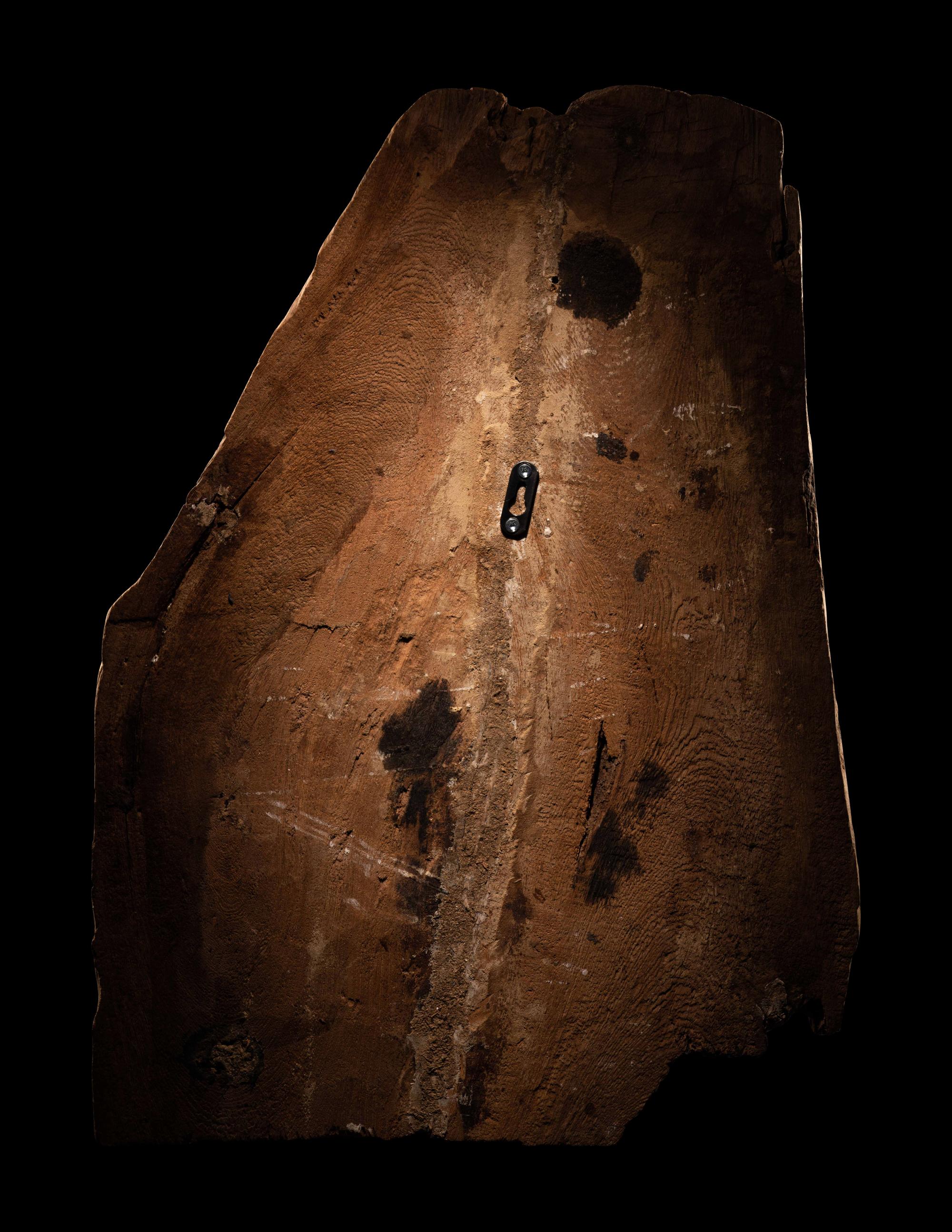An Egyptian Polychrome Wood Fragment of a Sarcophagus with Isis