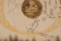 A 1980 Muhammad Ali's Entourage and Sugar Ray Robinson Signed Ceasars Palace Placemat,