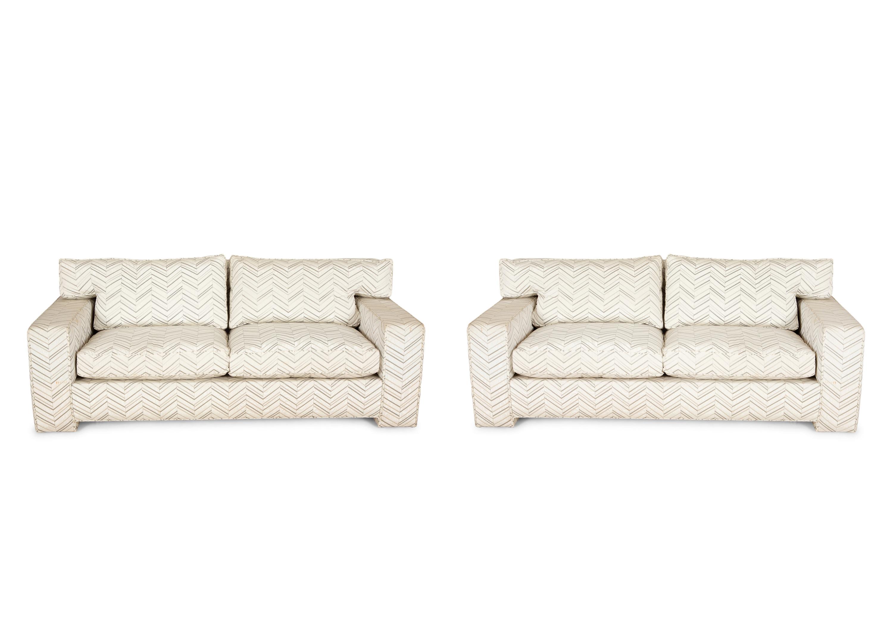 A Pair of Contemporary French Chevron Patterned Upholstered Sofas