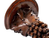 A Pair of Continental Carved Walnut Wall Brackets