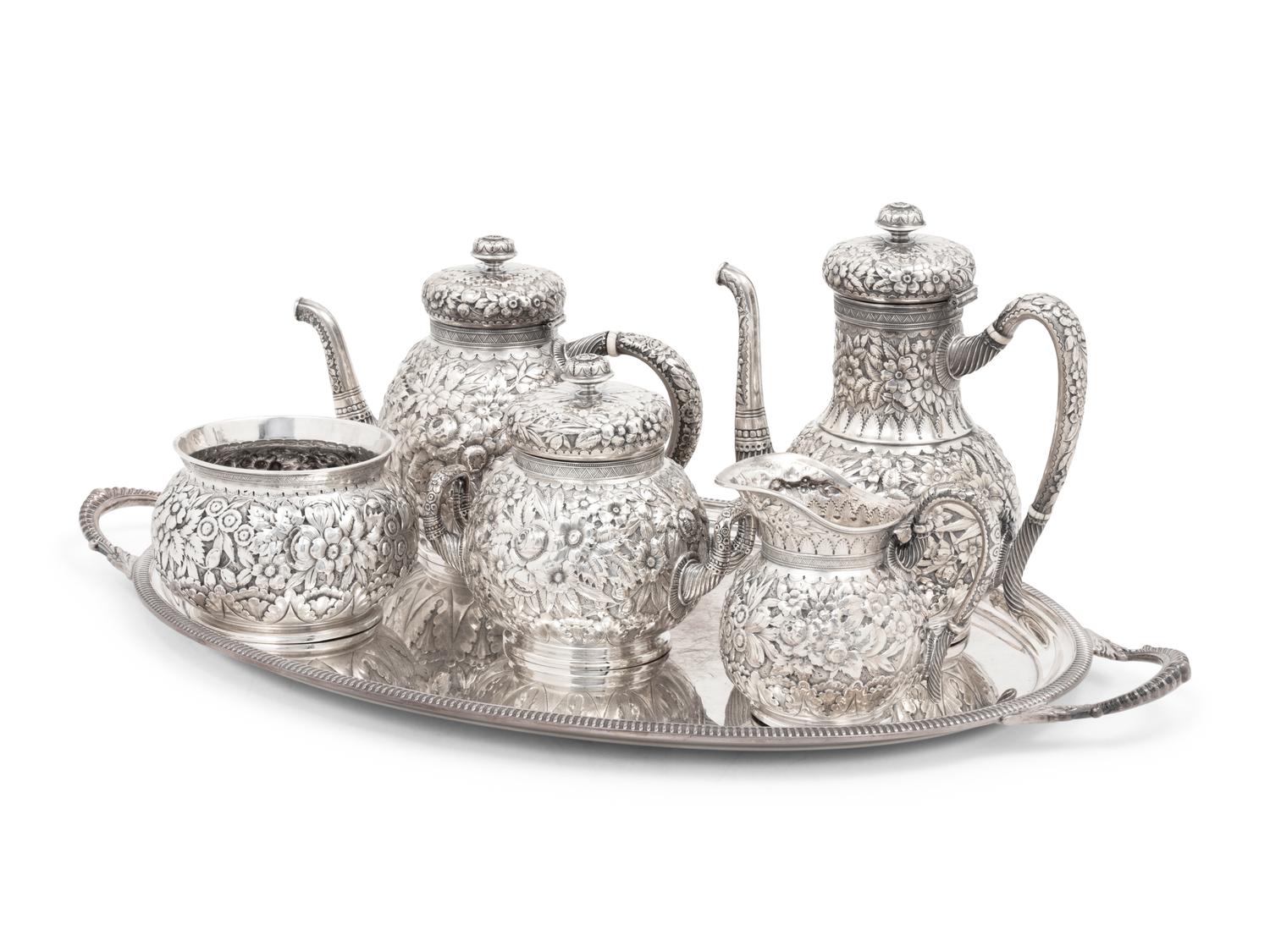 A Tiffany and Co. Silver Repoussé Five-Piece Tea and Coffee Service