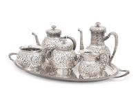 A Tiffany and Co. Silver Repoussé Five-Piece Tea and Coffee Service
