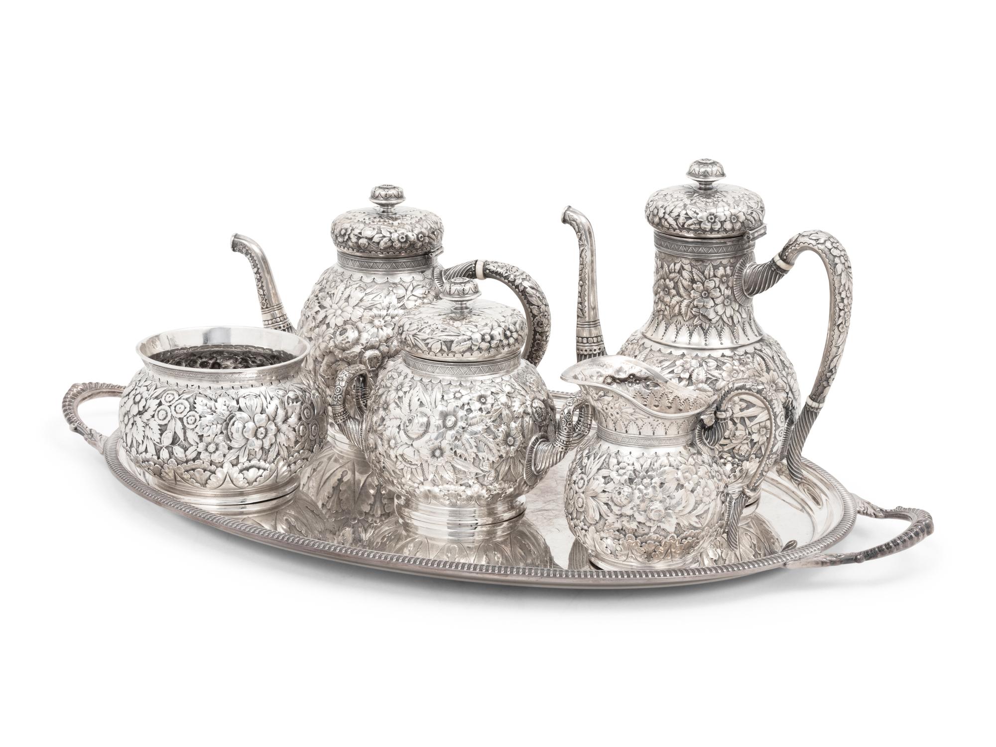 A Tiffany and Co. Silver Repoussé Five-Piece Tea and Coffee Service