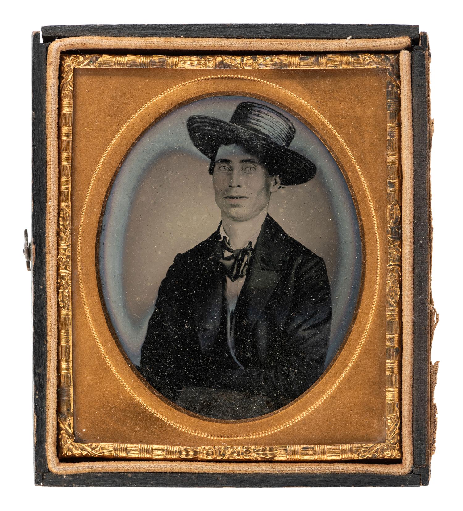 [INDIAN TERRITORY]. Sixth plate ambrotype portrait of man in straw hat.