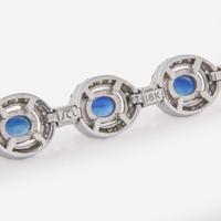 An 18K White Gold, Sapphire, and Diamond Bracelet
