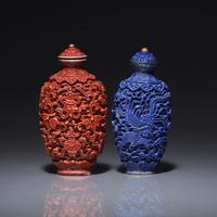 Two Chinese Molded and Enameled Porcelain Snuff Bottles, Possibly Jiaqing Period 或爲清嘉慶 瓷雕鼻烟壺兩支