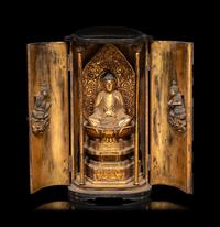 A Japanese Gilt and Black Lacquered Wood Buddhist Shrine with a Figure of a Seated Buddha
