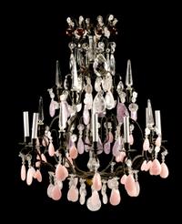 A Louis XV Style Patinated Bronze, Rock Crystal, Amethyst and Rose Quartz Eight-Light Chandelier Height 36 x diameter 28 inches.