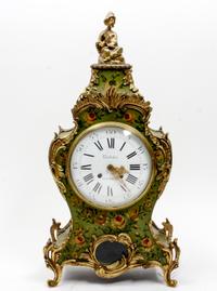 A Louis XV Style Gilt Metal Mounted Painted Mantel Clock Height 21 inches.