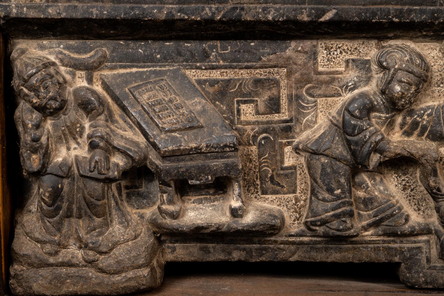 A Chinese Relief Carved Stone Stele Panel on Fitted Wood Stand