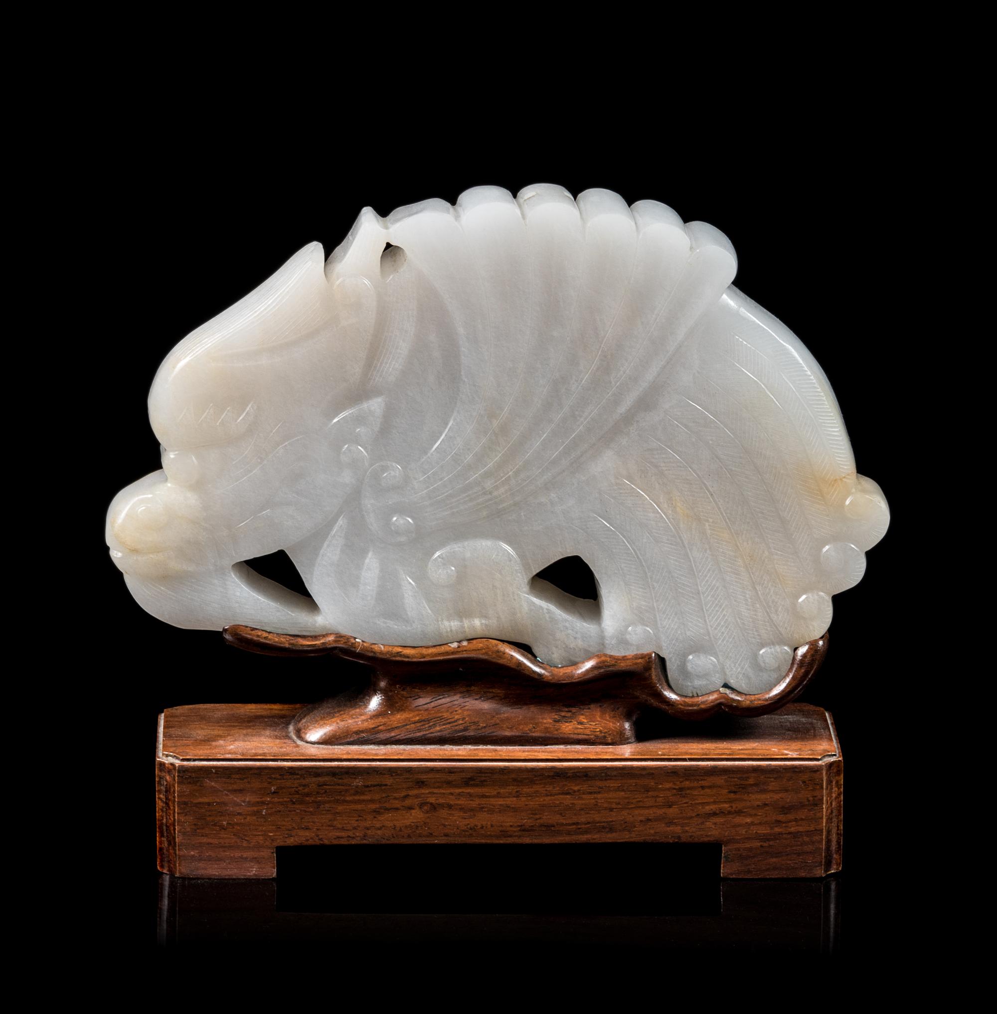 A White Jade Figure of Dragon Fish Height 4 inches. — 20TH CENTURY
