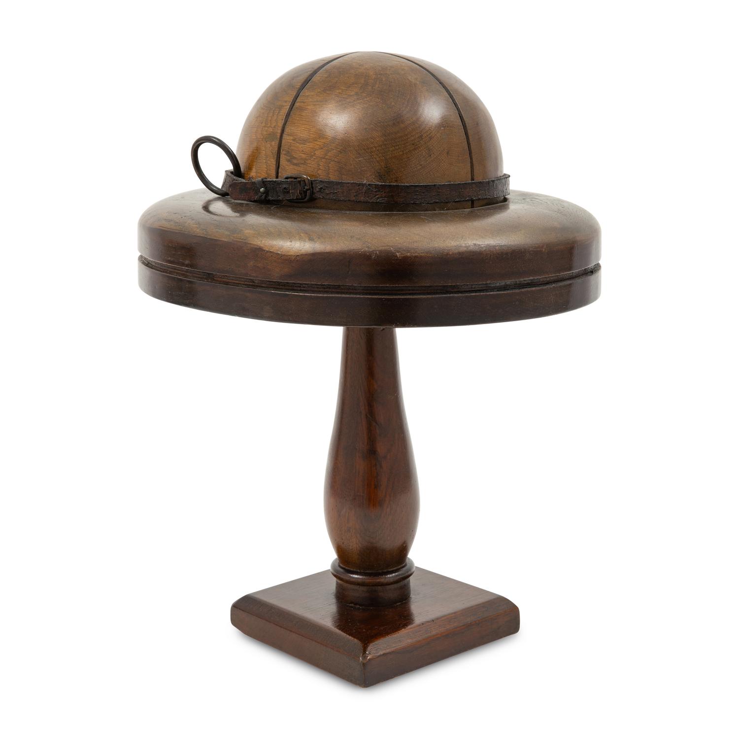 A Walnut and Leather Hat Block or Millinery Form