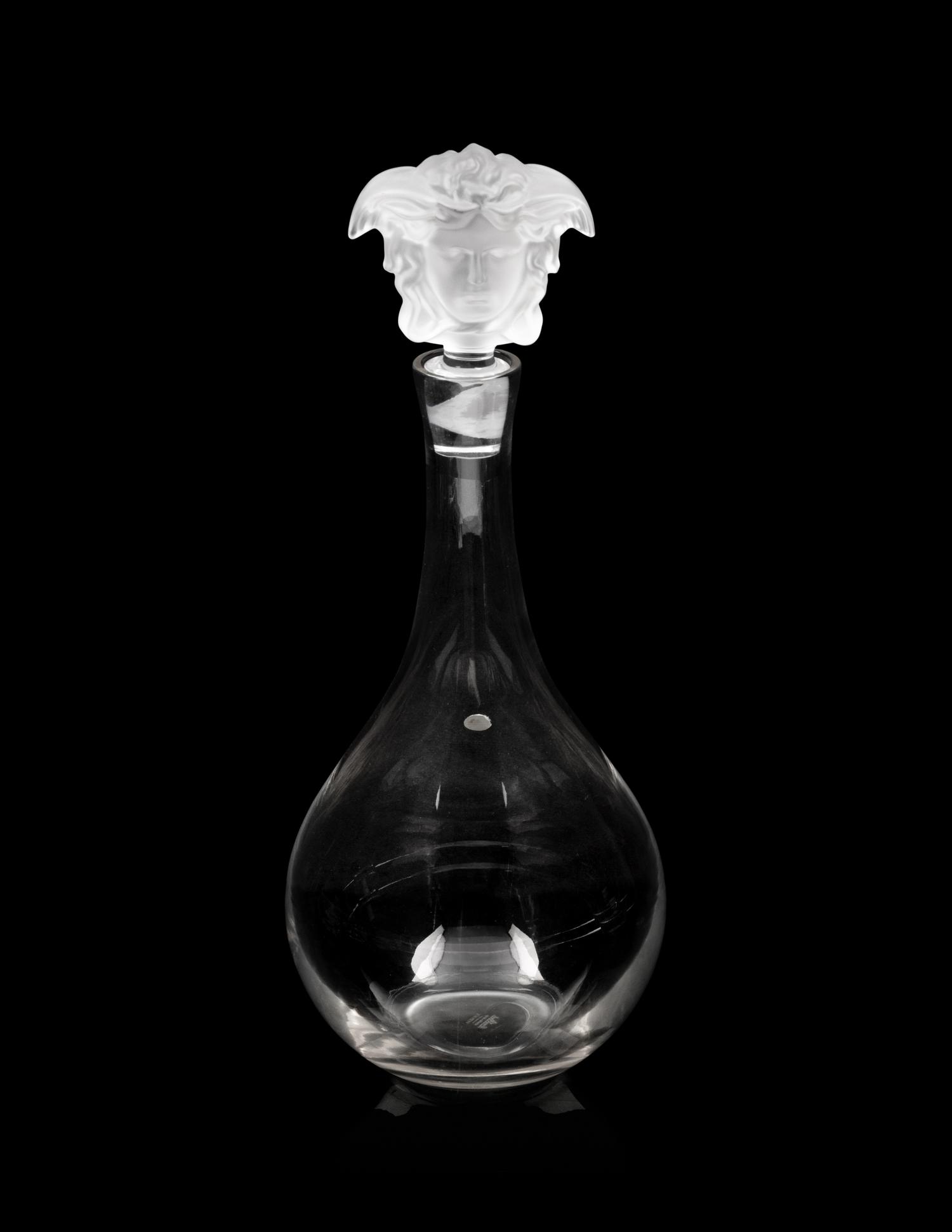 A Group of Versace Medusa Lumiere Glass Articles