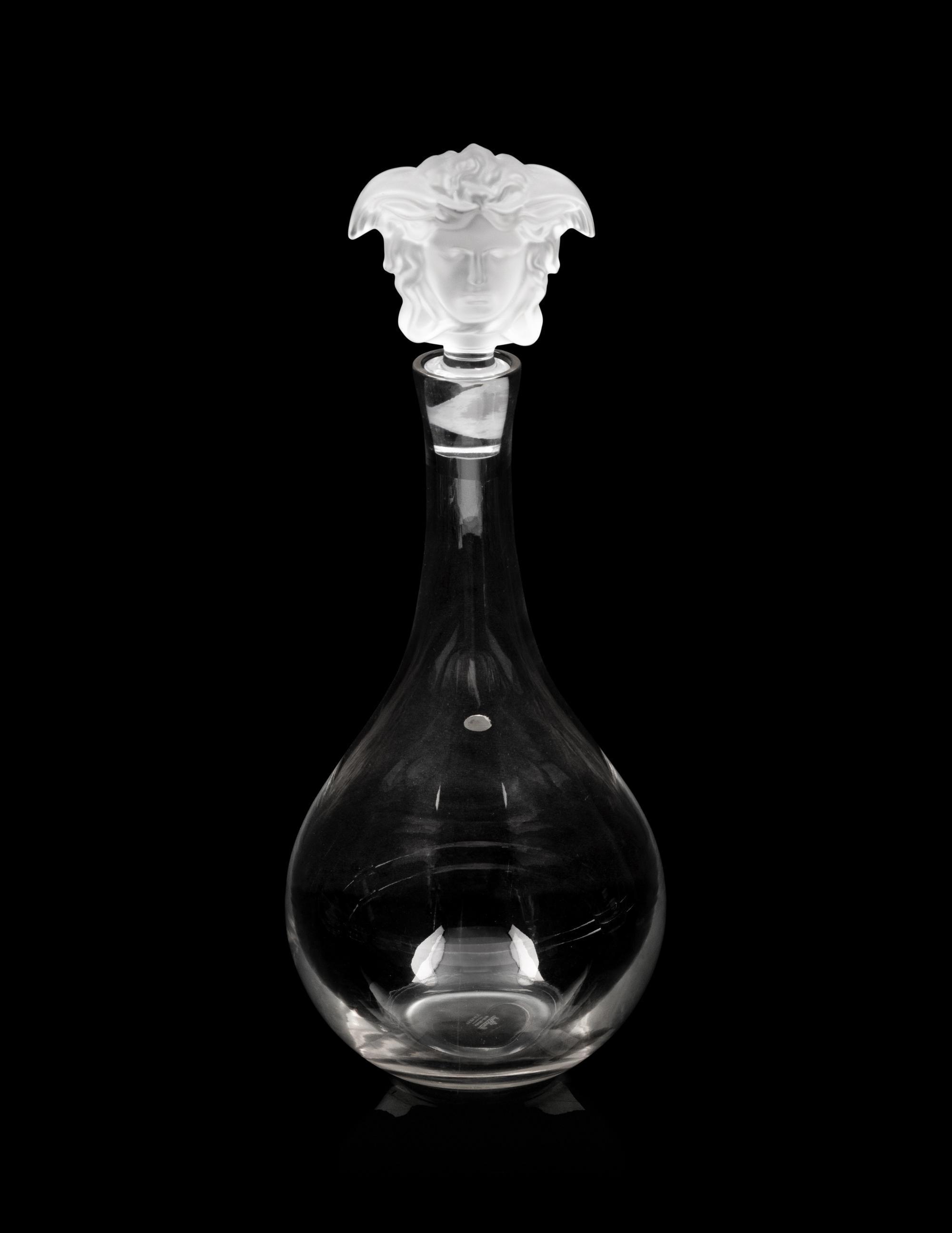 A Group of Versace Medusa Lumiere Glass Articles