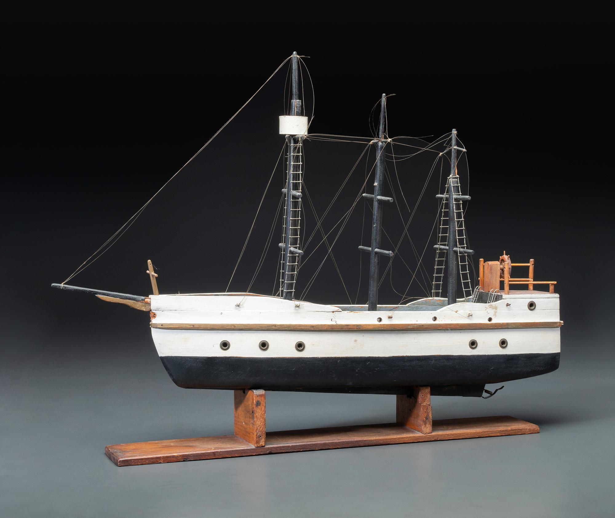 A Carved and Painted Wood Three-Masted Ship Model