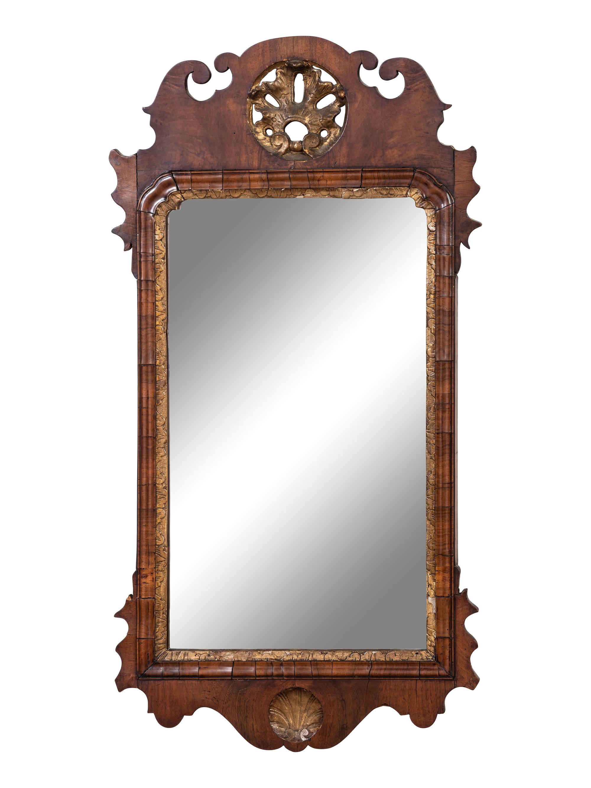 A George III Style Parcel Gilt Carved Walnut Mirror