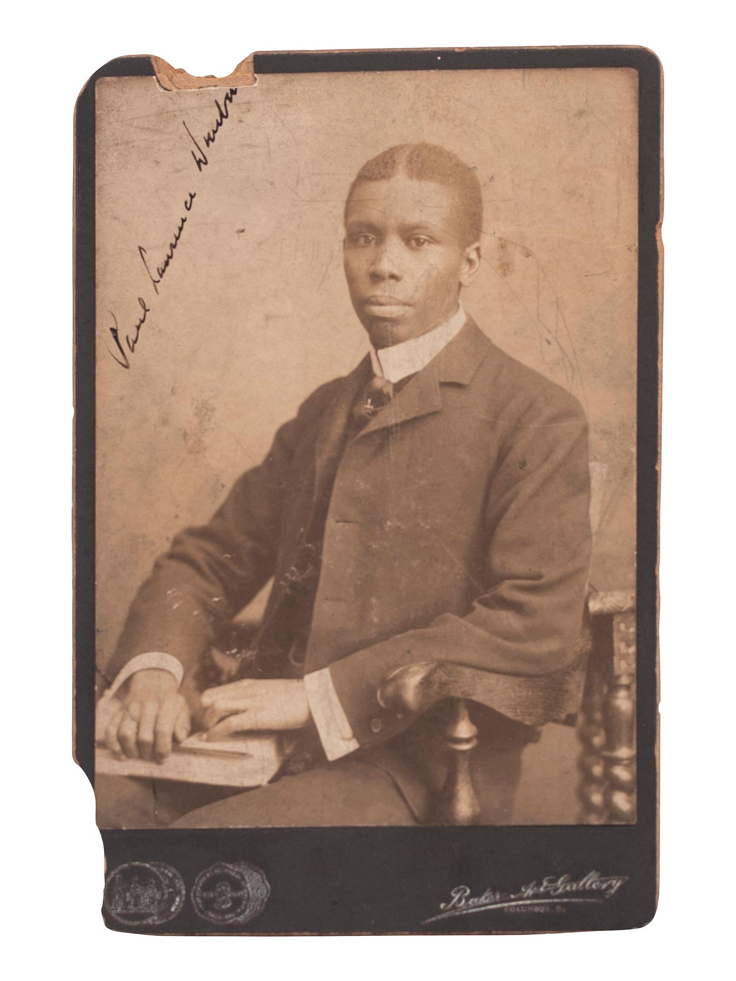 DUNBAR, Paul Laurence (1872-1906). Signed cabinet card portrait. Columbus, OH: Baker Art Gallery, ca 1901.