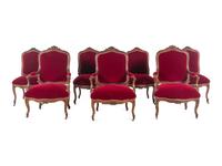 An Italian Louis XV Style Carved and Parcel Gilt Walnut Parlor Suite