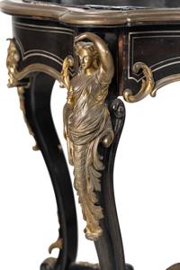 A Napoleon III Gilt Bronze Mounted Ebonized Jardinière Table