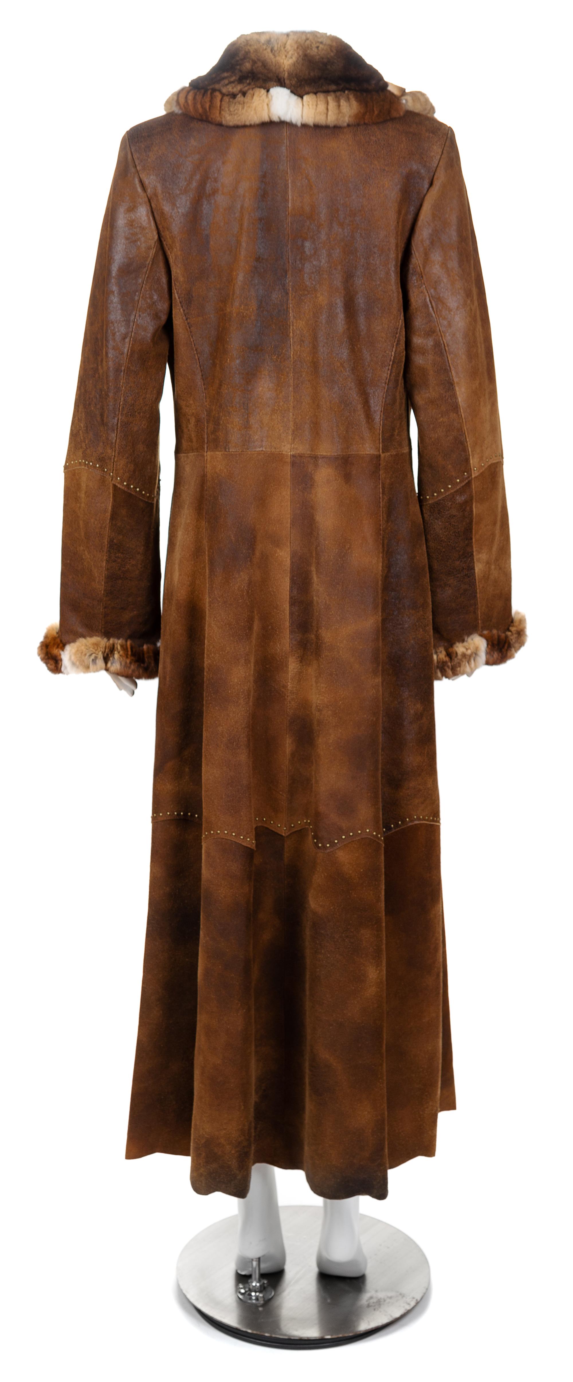A Leather and French Lepom Rabbit Trimmed Full Length Coat, Size 42.