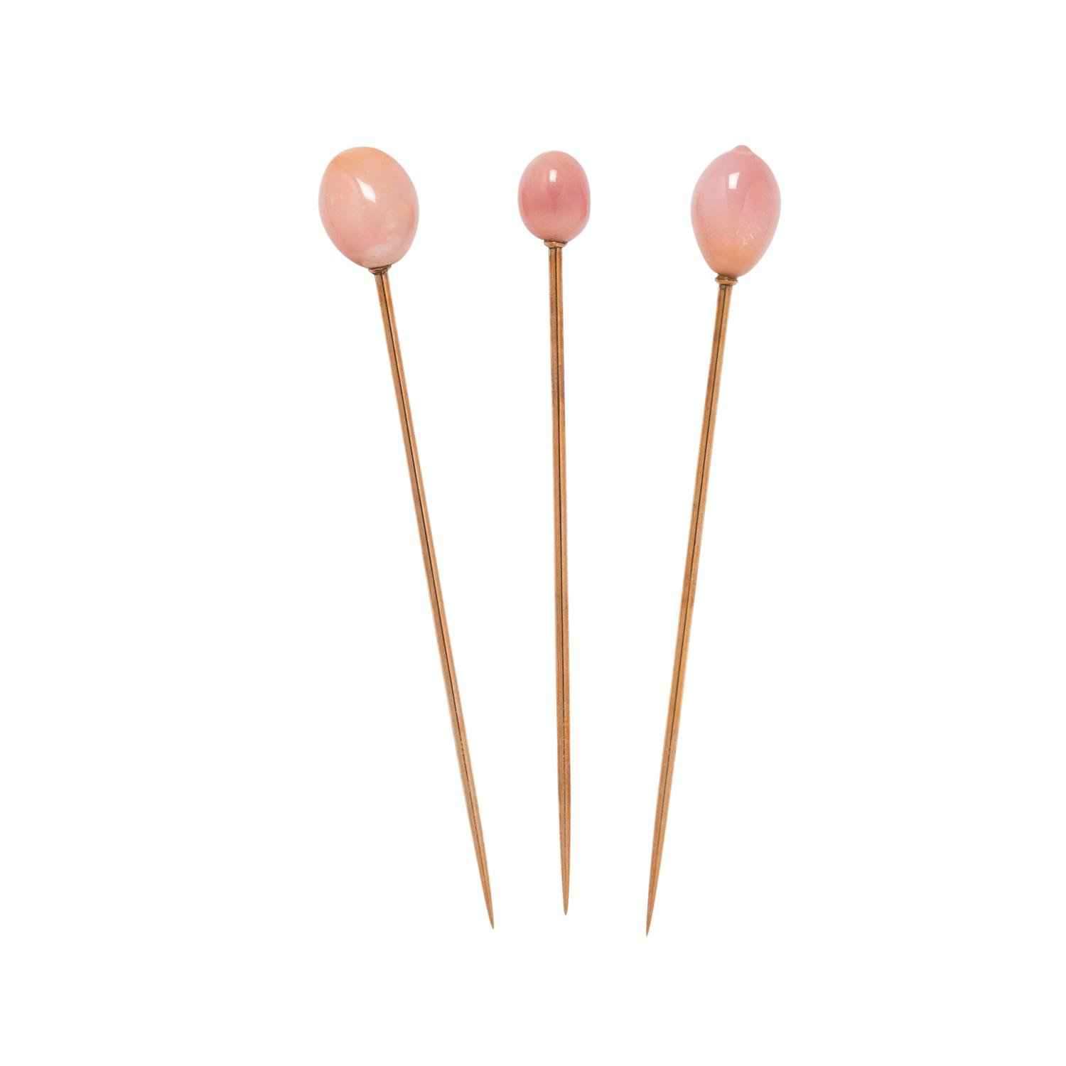 COLLECTION OF CONCH PEARL STICK PINS