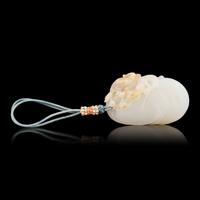 A Chinese Russet and White Jade 'Bird on Prunus' Pendant, Possibly 18th Century 或清中期 梅雀爭春巧雕玉珮