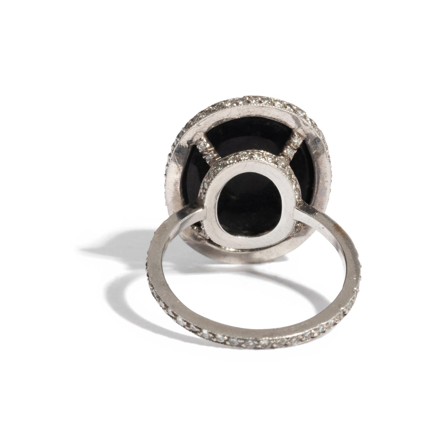 A Roman Banded Agate Ring Stone with the Infant Eros Holding a Butterfly — Set in a silver ring