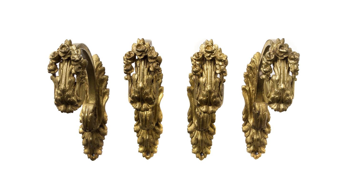 A Set of Four Gilt Bronze Curtain Tiebacks, Height 7 1/2 inches.