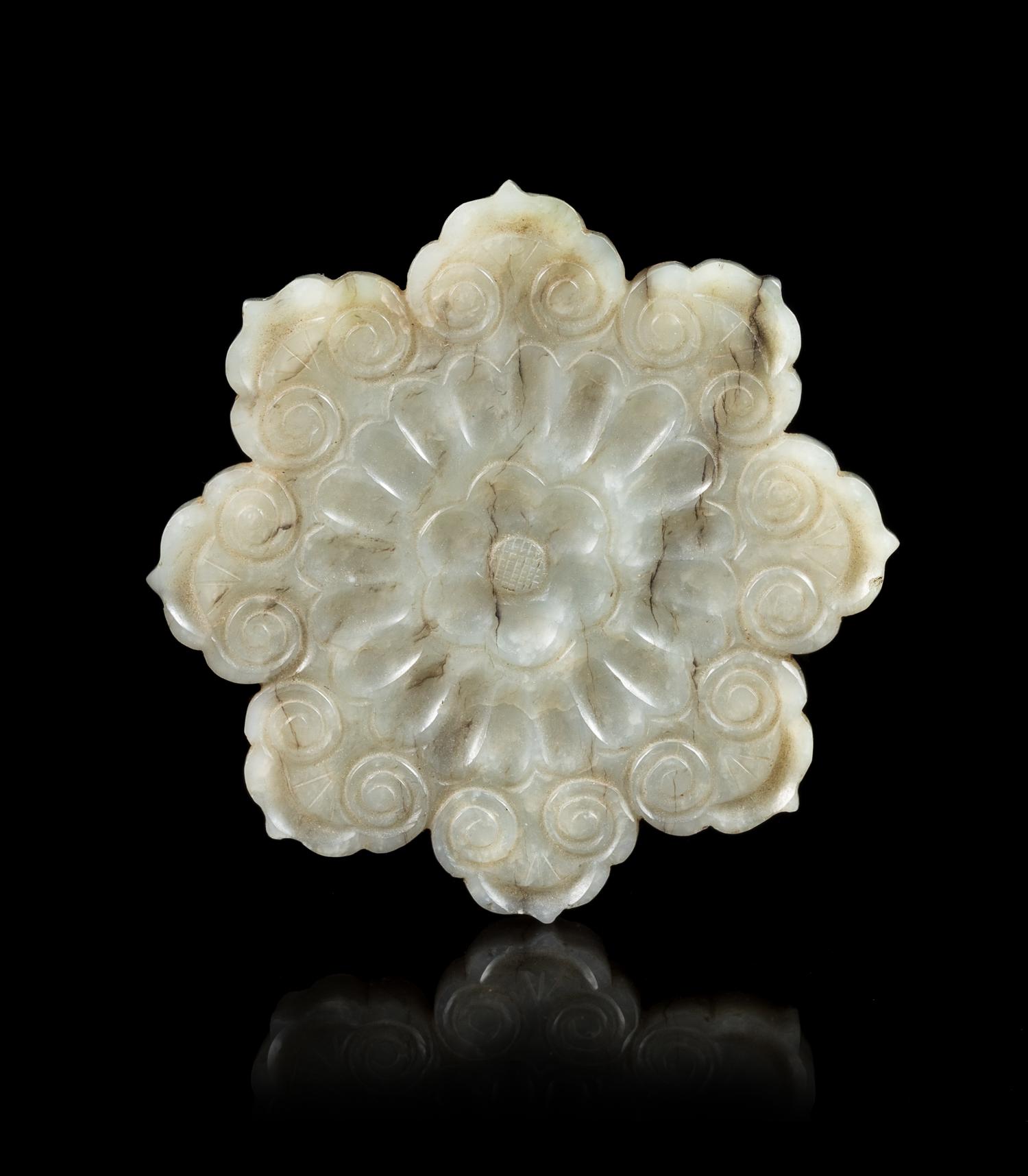 A Grey Jade Mughal Style 'Flower' Plaque Diameter 2 5/8 inches. — 17TH CENTURY