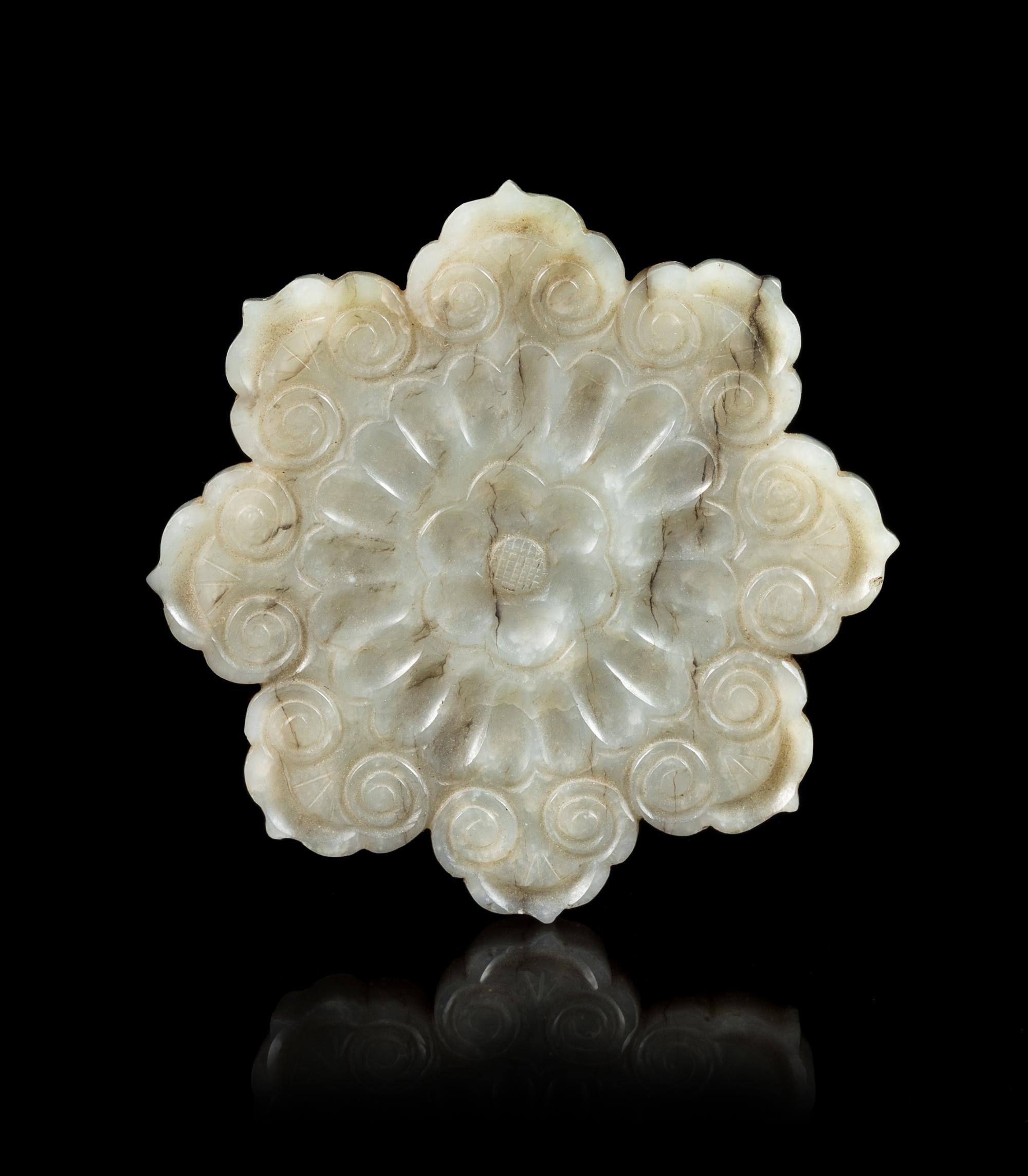 A Grey Jade Mughal Style 'Flower' Plaque Diameter 2 5/8 inches. — 17TH CENTURY