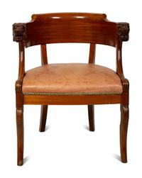 A Regency Style Carved Mahogany Barrel Back Armchair with Lion Head Terminals — 19TH/20TH CENTURY