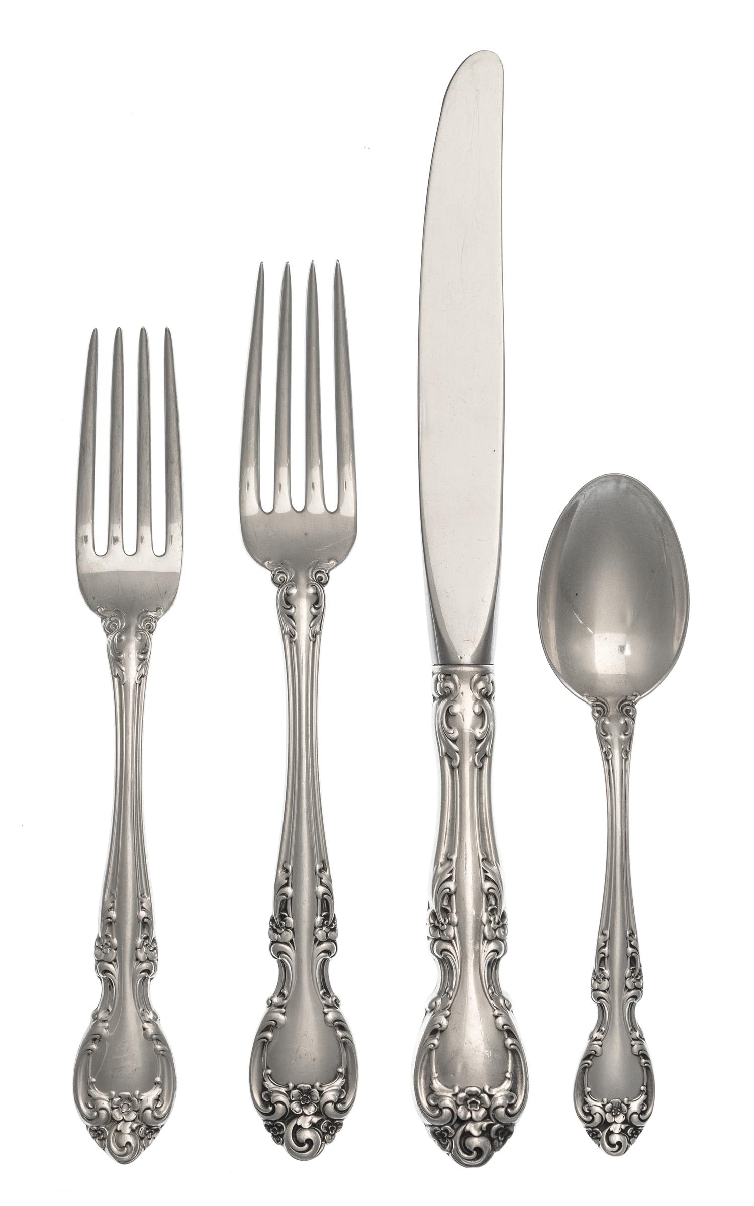 An American Silver Flatware Service, Gorham Mfg. Co., Providence, RI, Melrose pattern, comprising: 12 dinner knives 12 dinner forks 12