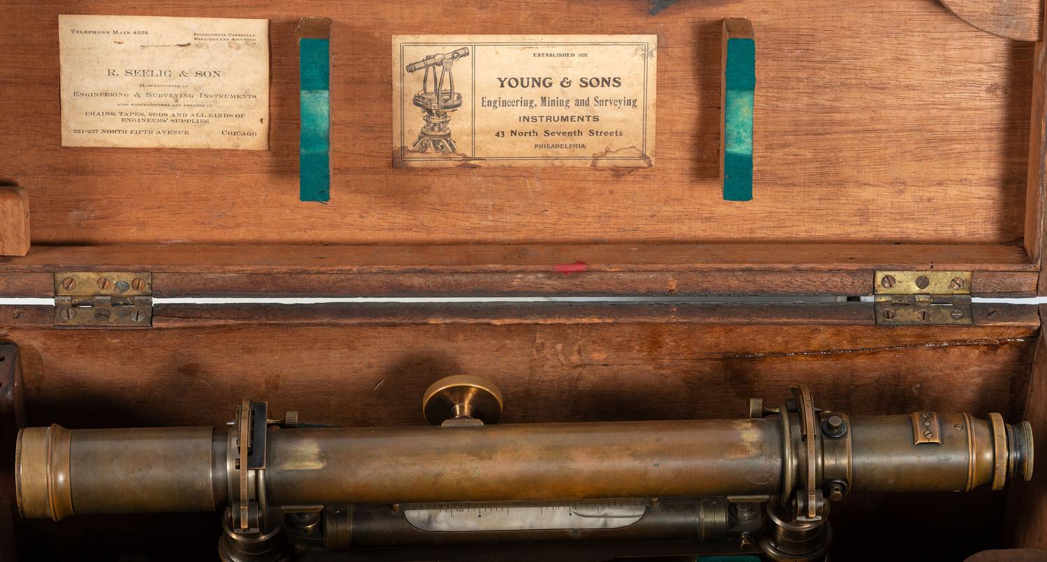 [SCIENCE & TECHNOLOGY]. 19th-century surveyor’s set, incl. optics, tripod, and measuring stick.