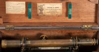 [SCIENCE & TECHNOLOGY]. 19th-century surveyor’s set, incl. optics, tripod, and measuring stick.
