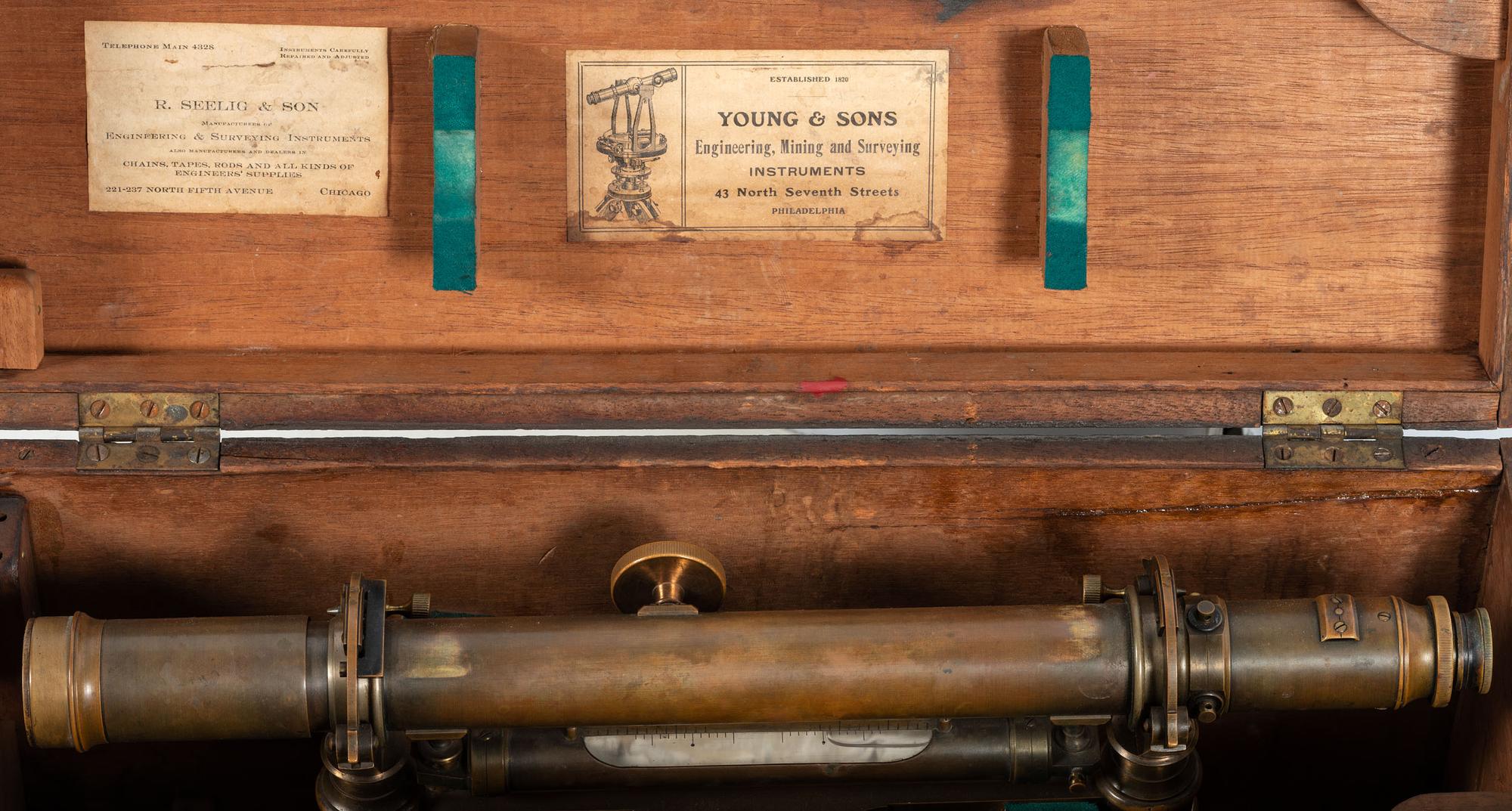 [SCIENCE & TECHNOLOGY]. 19th-century surveyor’s set, incl. optics, tripod, and measuring stick.