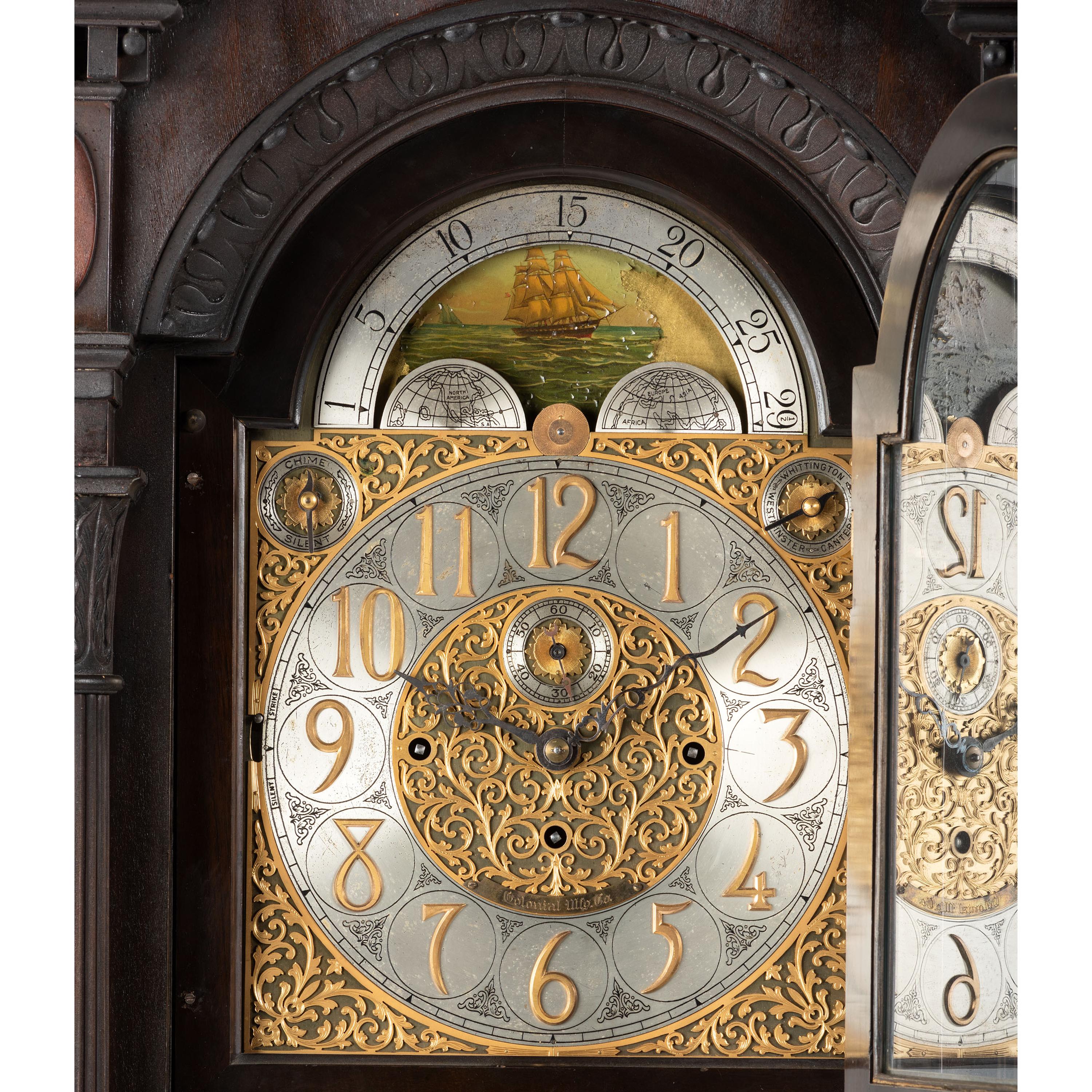 An American Mahogany Nine-Tube Tall Case Clock by Colonial Mfg. Co.