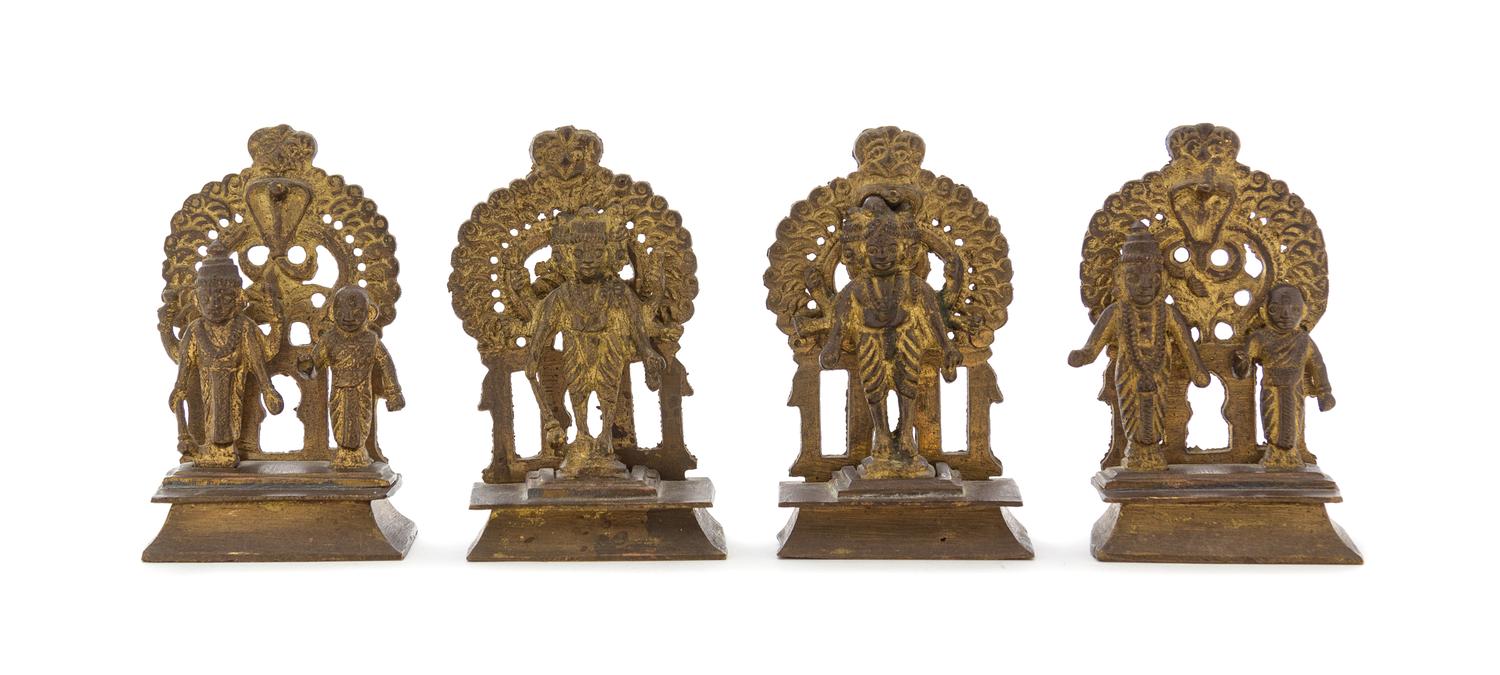 Four Indian Gilt Bronze Figures Height of each 3 5/8 inches.