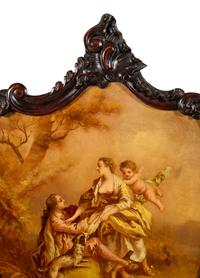 A Louis XV Style Carved Walnut Floor Screen with Inset Painted Panels