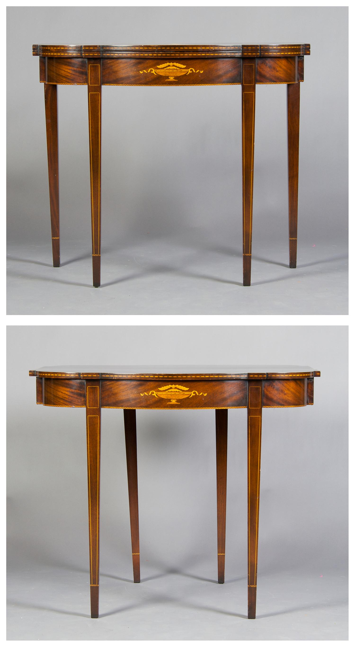An Inlaid Mahogany Games Table, Height 30 3/4 x width 36 x depth 17 3/4 inches closed.