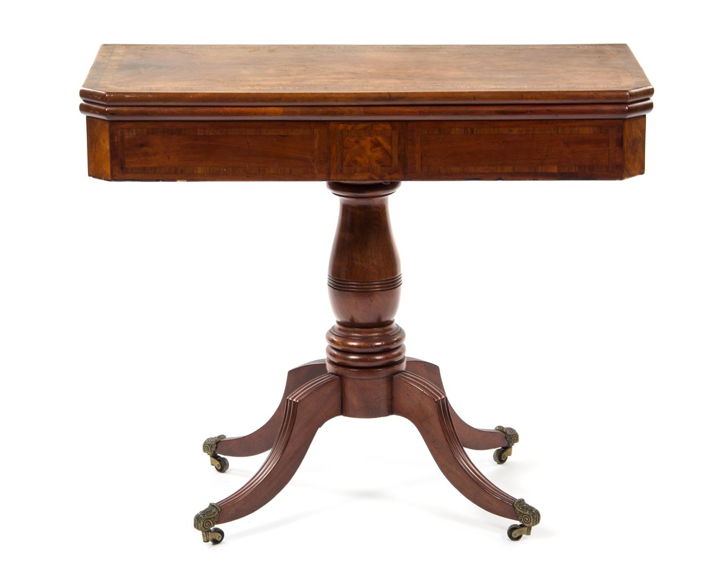 A Georgian Style Mahogany Flip-Top Game Table, Height 28 1/2 x width 46 1/2 x depth 59 1/2 inches (extended).