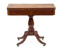 A Georgian Style Mahogany Flip-Top Game Table, Height 28 1/2 x width 46 1/2 x depth 59 1/2 inches (extended).