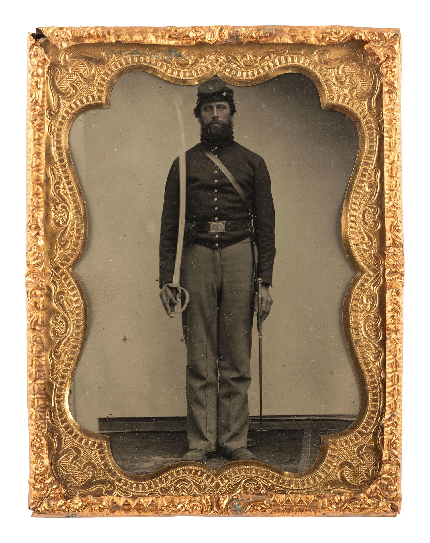 [CIVIL WAR]. Quarter plate tintype of a Union cavalry soldier displaying his saber.