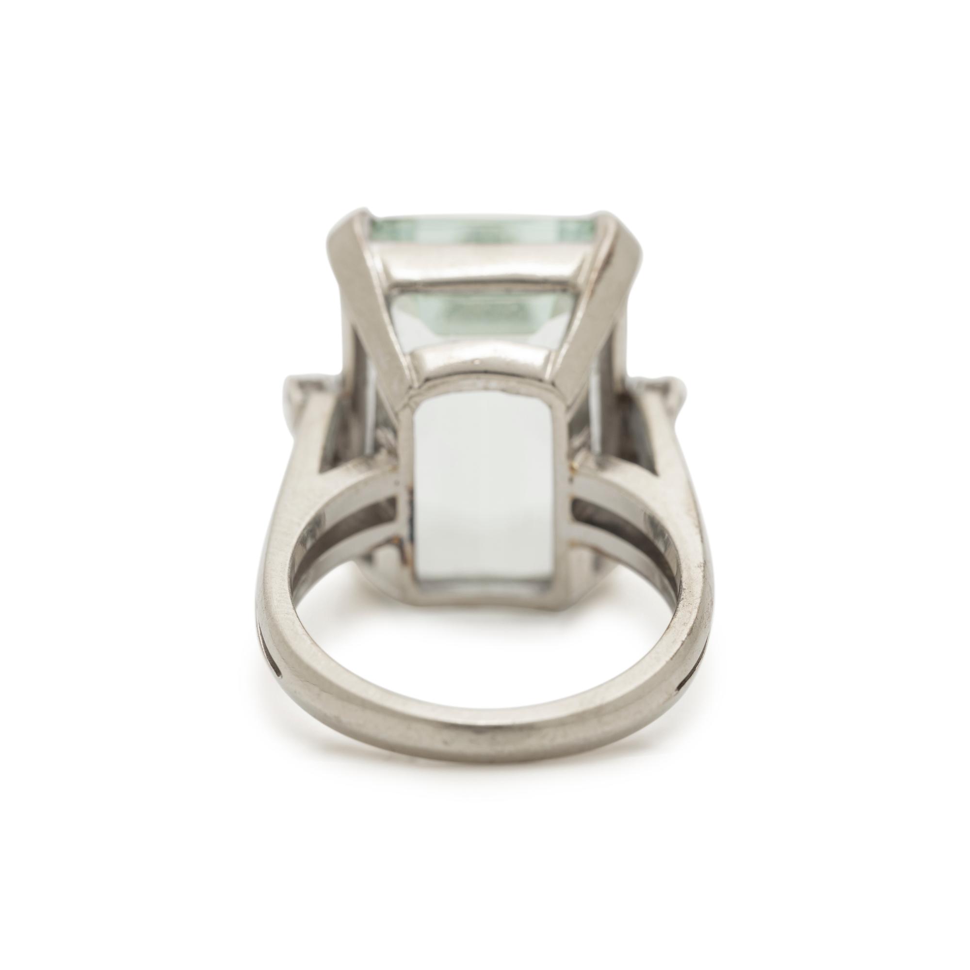 AQUAMARINE AND DIAMOND RING